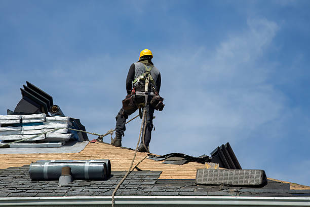 Professional Gutter Installation technician working in Winfred, SD